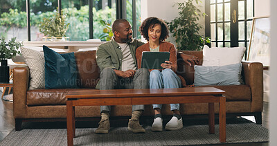 Buy stock photo Tablet, smile and black couple in living room for bonding, streaming and happy in home. African man, woman and technology with comedy movie, film or funny video with meme or joke on social media