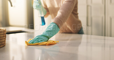 Buy stock photo Person, hands and cleaning surface with detergent in kitchen for housekeeping or hygiene in home. Cleaner, wipe and counter with gloves, cloth or spray bottle for bacteria, germ or dirt removal