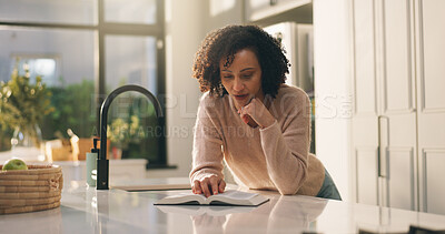 Buy stock photo Woman, reading and kitchen with bible for holy study, religious belief or christianity in home. Female person, christian and faith with gospel or book of God for religion, worship or praise in house