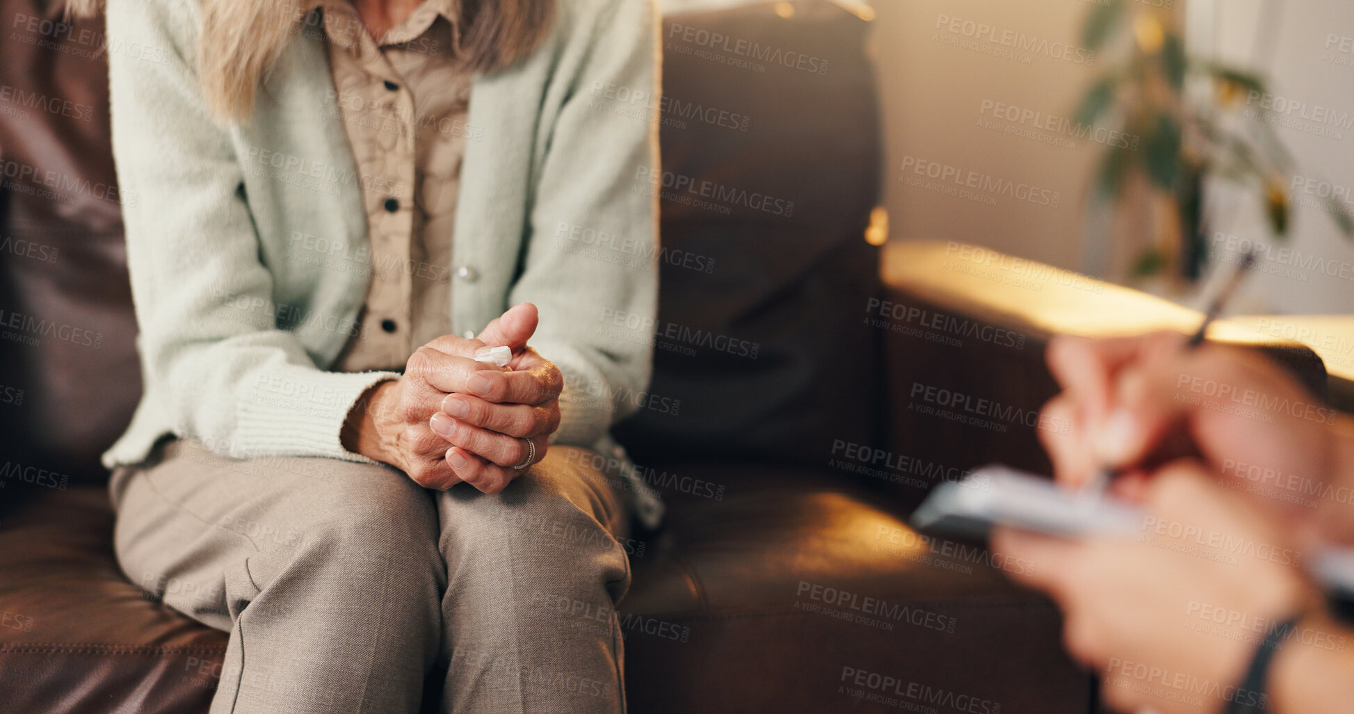 Buy stock photo Anxiety, patient and hands in therapist office, mental health support and assessment for counselling. Psychologist, consultation or person nervous for evaluation, talking and diagnosis notes for help