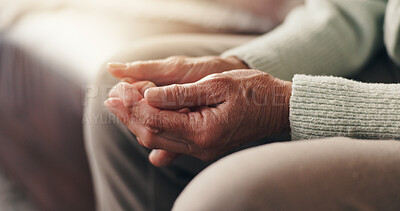 Buy stock photo Faith, hands and praying with senior person on sofa in living room of home for belief in God. Holy, prayer and religion with elderly Christian in apartment for healing, spirituality or trust in Jesus