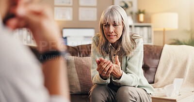 Buy stock photo Sad, senior woman and talk with therapist in office for counseling, mental health and psychology. Elderly person, explain and psychologist for depression, past trauma and therapy session for healing