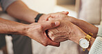 Psychologist, patient and holding hands in clinic with empathy, consultation and compassion for grief. Therapist, person and support in appointment with trust, counseling help and sympathy for loss.
