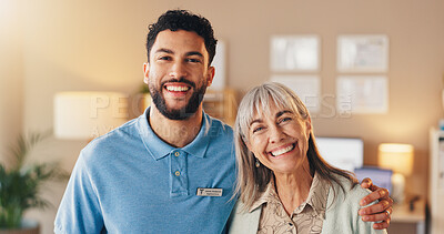 Buy stock photo Hug, portrait and smile of nurse with old woman in home living room for support or wellness. Healthcare, medical or retirement with man and senior patient in apartment together for bonding or trust