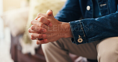 Buy stock photo Hands, nervous and person in therapy for anxiety, counseling session or waiting for consultation. Psychology, mental health and man with stress in clinic office, worry and appointment for trauma