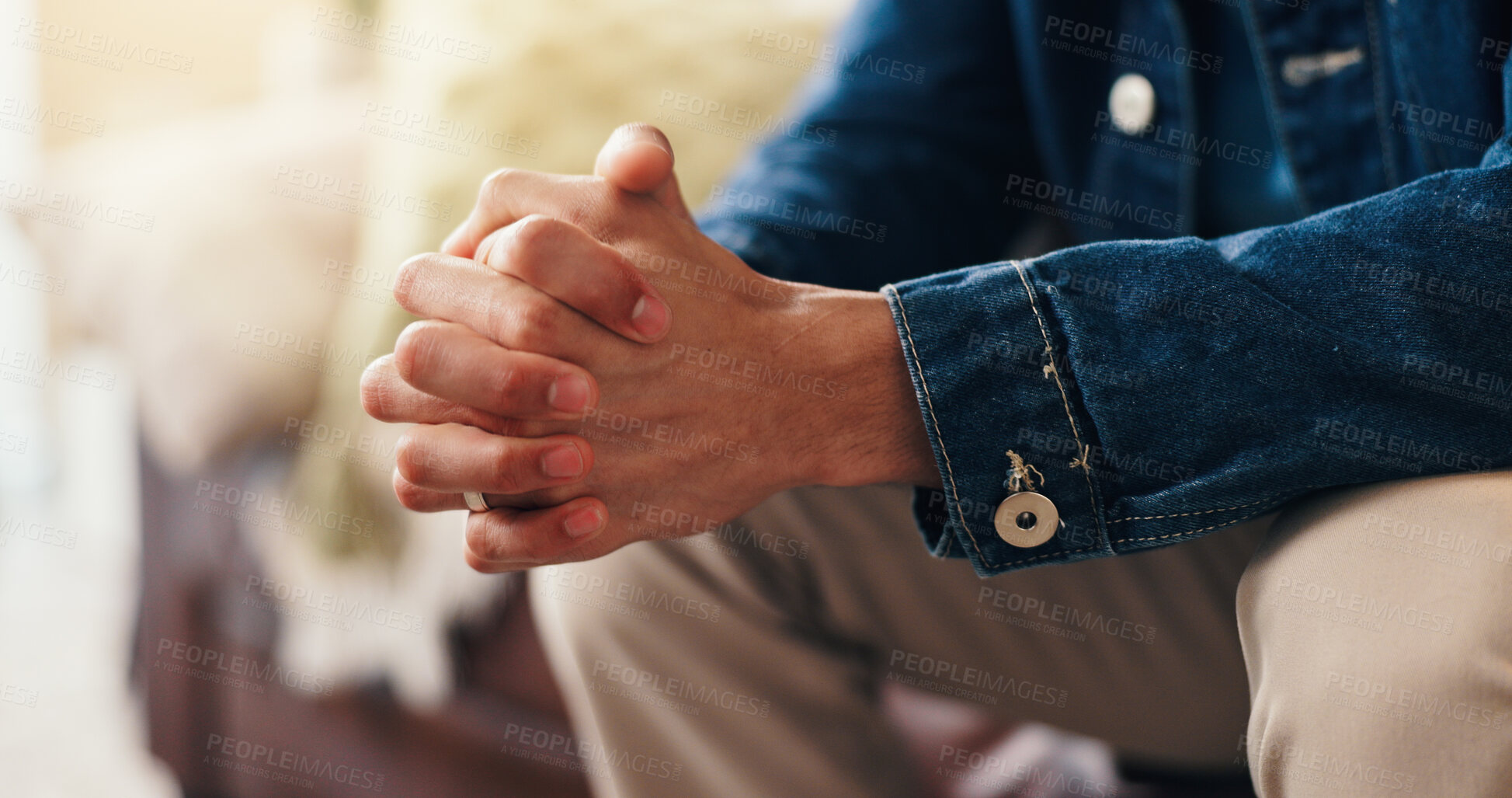 Buy stock photo Hands, nervous and person in therapy for anxiety, counseling session or waiting for consultation. Psychology, mental health and man with stress in clinic office, worry and appointment for trauma