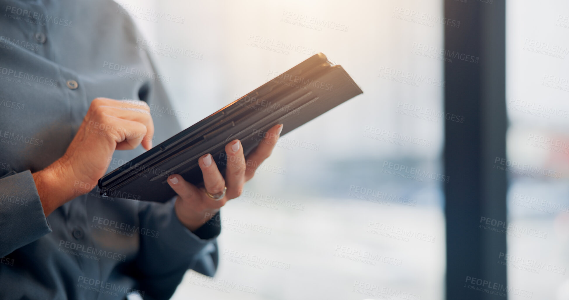Buy stock photo Design, hands and tablet with business person in city workplace for agenda, planning or research. App, development and schedule with designer ay window in office for digital report or online review