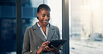 Finance, tablet and window with business black woman in city workplace for planning or research. App, investment and schedule with African accountant in office for digital report or online review
