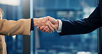 Corporate, people and greeting with handshake in office for meeting, welcome and investment deal. Team, shaking hands and introduction for partnership, agreement and negotiation for financial offer