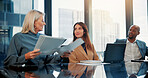 Business people, discussion and meeting with documents for proposal, ideas or project in office. Group, employees or conversation with paperwork for company brief, performance review or team report