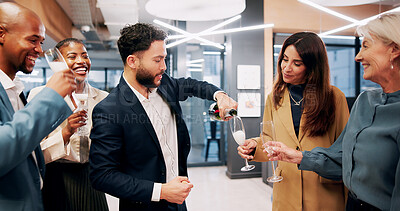 Buy stock photo Happy, business people and pour with champagne for celebration, social gathering or event. Excited, group or employees with smile, glasses or alcohol for toast, success or party together in workplace
