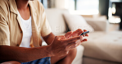 Buy stock photo Hands, man and relax with phone in home for social media, browsing website and text message. Male person, reading and mobile for networking, communication and texting contact with notification update