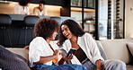 Women, friends and laugh on sofa with phone in home, share meme or funny video in living room. People, smartphone and relax on couch with joke, post and mobile app for social media at apartment