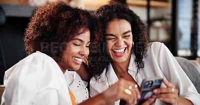 Buy stock photo Laugh, scroll or women in house with phone, funny post or bonding together with social media update. Happy, online comic or friends on couch with tech, app browsing or meme reaction in living room.