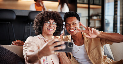 Buy stock photo Selfie, portrait or men on couch with peace sign, bonding or online memory for social media. Digital, smile or friends in house with gestures, moment capture or connection for profile update.

