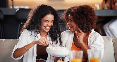 Buy stock photo Laugh, popcorn and women on sofa for conversation, chat and talking for hangout together. Home, happy and people on couch with snack and funny joke, gossip and humor for bonding, reunion and visit