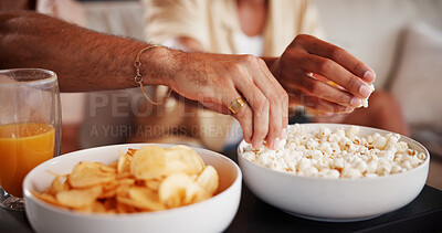 Buy stock photo Hands, friends and eating popcorn in home with bonding, relax and break with bowl in lounge. People, share snacks and chips with drinks, reunion or chill in living room on weekend at apartment