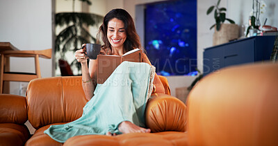 Buy stock photo Coffee, reading book and woman on sofa in home for hobby, relax and literature for learning. Happy, house and person with drink and novel, story or fiction for peace, calm and literacy in living room