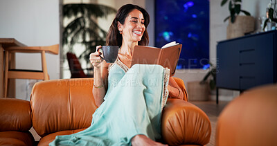 Buy stock photo Laugh, reading book and woman on sofa with coffee for hobby, relax and literature for knowledge. Happy, home and mature person with drink and novel, funny story and fiction for me time in living room
