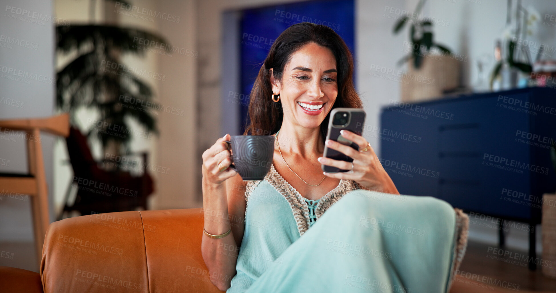 Buy stock photo Coffee, phone and relax with woman on sofa for dating app, social media and text message. Matchmaking website, online relationship forum and communication with person and tea in living room of home