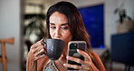 Coffee, cellphone and woman on sofa in home with networking, contact or social media on mobile app. Tech, phone and female person with warm beverage for communication online in living room at house.
