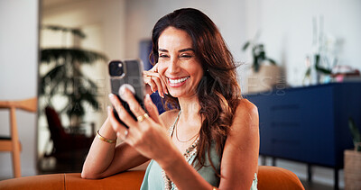 Buy stock photo Woman, smile and video call in home with phone, network or internet for online communication on weekend. Happy, mature person and connection in living room with tech, contact or virtual conversation.