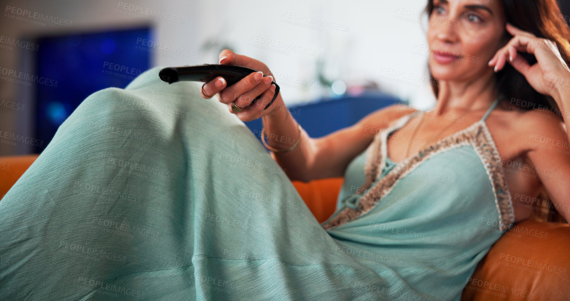 Buy stock photo Woman, watching tv and sofa with remote for entertainment, app or online subscription in home. Female person, streaming or change channel with control on couch for movie, series or news in house