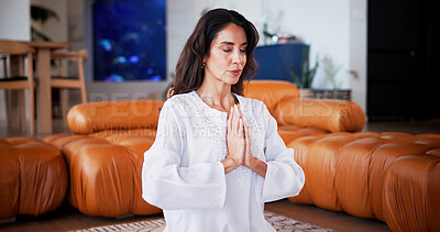 Buy stock photo Meditation, prayer hands and woman in house for wellness, self care or health in living room. Yoga, calm and female person with balance for peace, zen or grounding exercise in morning at apartment.