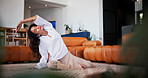 Stretching, yoga and fitness with woman in home for health, holistic balance and self care. Posture improvement, healing and wellness with mature person on floor of living room in apartment for peace