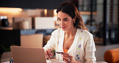 Buy stock photo Credit card, new home and woman on laptop for online shopping, subscription and purchase. Moving in, ecommerce and person with bank info on computer for payment, transaction and buying furniture
