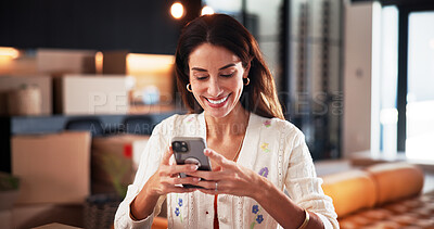 Buy stock photo Smile, phone and relax with woman in house for dating app, social media or text message. Matchmaking website, online relationship forum and communication with mature person in living room of home