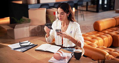 Buy stock photo Credit card, phone and woman in home with notebook for online shopping, ecommerce and purchase. Startup, remote work and person with bank info on cellphone for payment, business transaction or budget