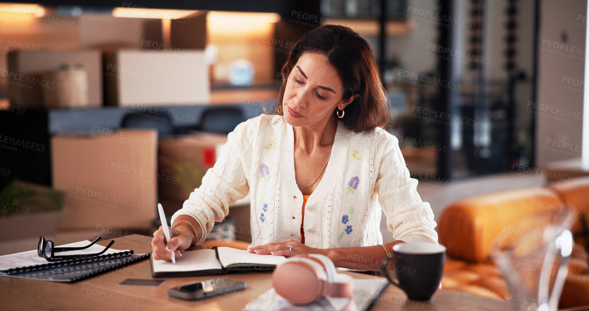 Buy stock photo Notebook, freelancer and woman with writing in home for proposal, article and remote work. Documents, mature journalist or female person with project, paperwork and planning for story editor in house