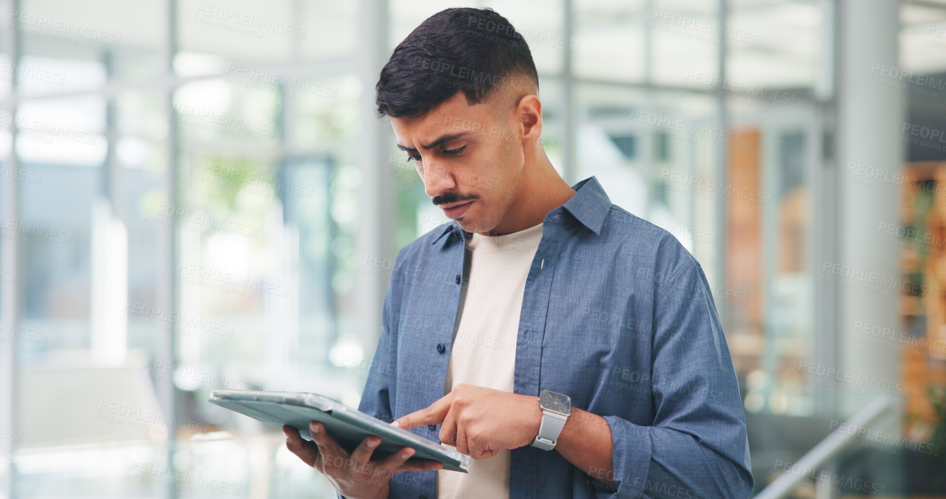Buy stock photo Man, tablet and typing at startup with project, glasses or insight with notes for story at media company. Person, tech and scroll on app for proposal, feedback and check report at creative agency