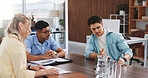 Creative, business people and meeting with laptop for proposal, company idea or design in office. Group, employees or pitch with computer for project development, growth or improvement in workplace