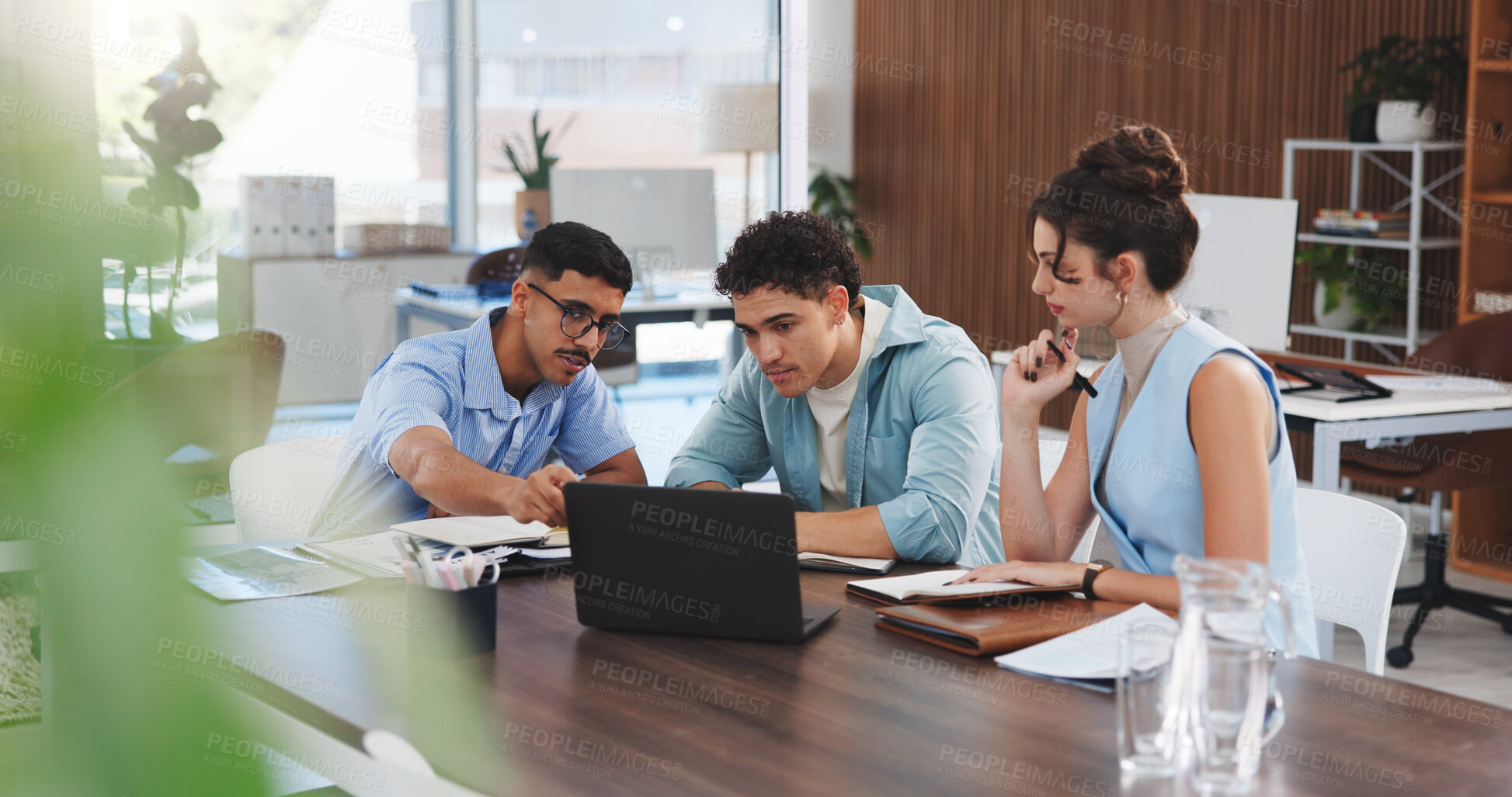 Buy stock photo Business, team and meeting with laptop in office for topics review, story ideas and brainstorming. Journalists, people and discussion with tech in newsroom for editorial planning or creative feedback