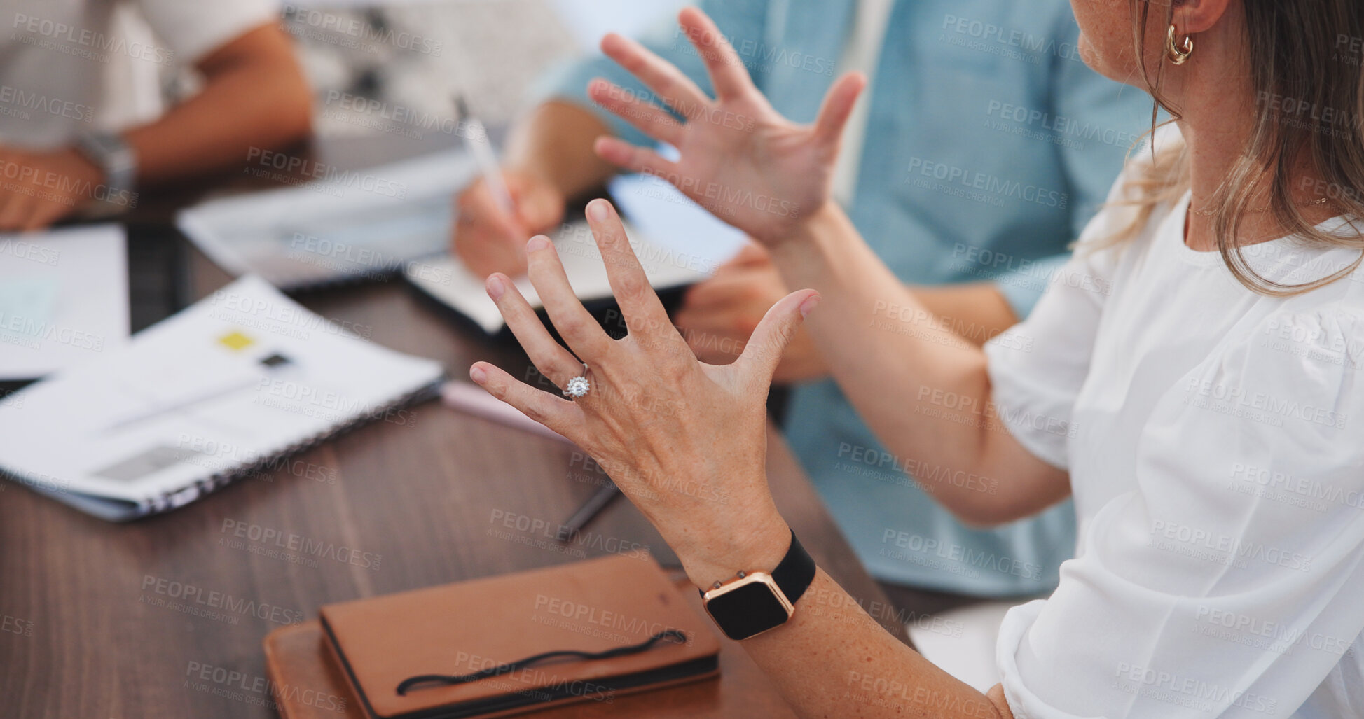 Buy stock photo Meeting, hands and woman with discussion in office for topics review, writing advice and guidance. Journalism, editor and feedback with team in newsroom for editorial planning, creative ideas or tips