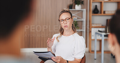 Buy stock photo Team, woman and meeting with document at agency for manuscript revision, article tips and feedback. Journalists, editor and brainstorming notes for creative advice, story pitch and editorial planning