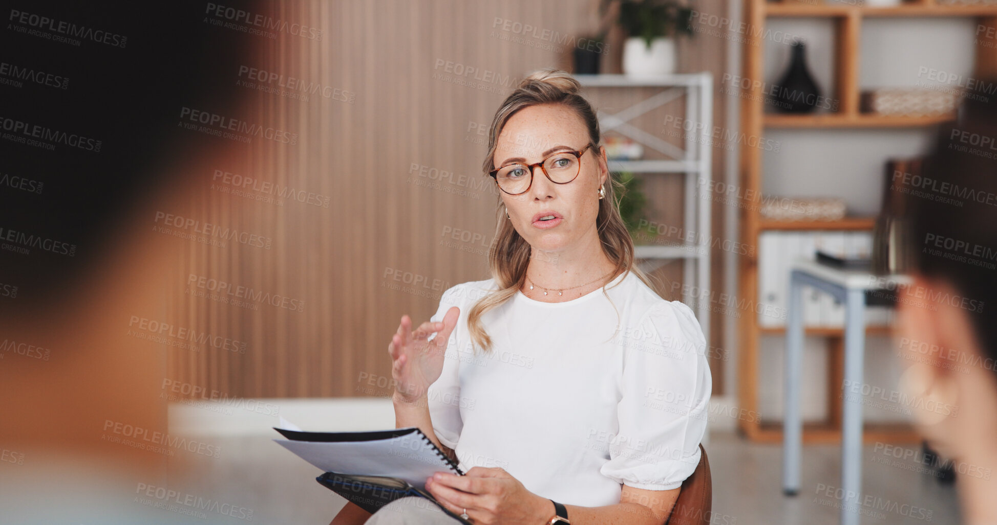 Buy stock photo Team, woman and meeting with document at agency for manuscript revision, article tips and feedback. Journalists, editor and brainstorming notes for creative advice, story pitch and editorial planning