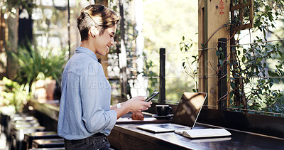 Buy stock photo Phone, planning and remote work with businesswoman in coffee shop for small business research. App, report and typing with freelance employee at outdoor cafe or restaurant for startup development