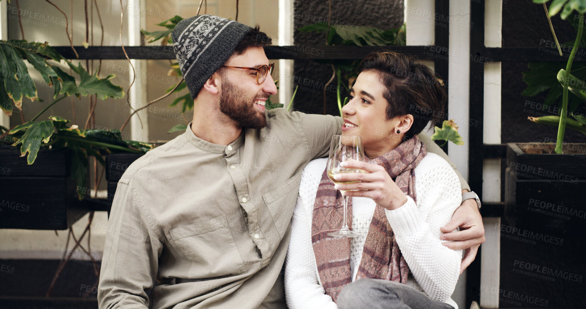 Buy stock photo Talking, wine and couple outdoor at restaurant for date on holiday together with bonding and connection. Smile, conversation and man with woman for drinking alcohol beverage at cafe on vacation.