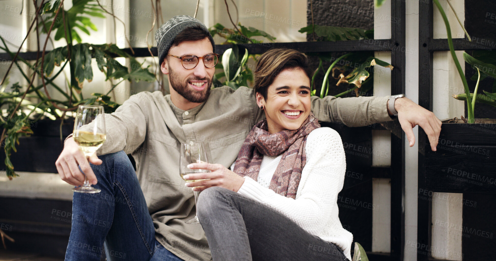 Buy stock photo Relax, wine and couple outdoor at restaurant for date on holiday together with bonding and connection. Happy, conversation and man with woman for drinking alcohol beverage at cafe on vacation.