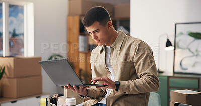 Buy stock photo Ecommerce, man and typing in office with laptop, logistics and supply chain report for distribution. Person, reading or research with computer, courier service or shipping website for small business.