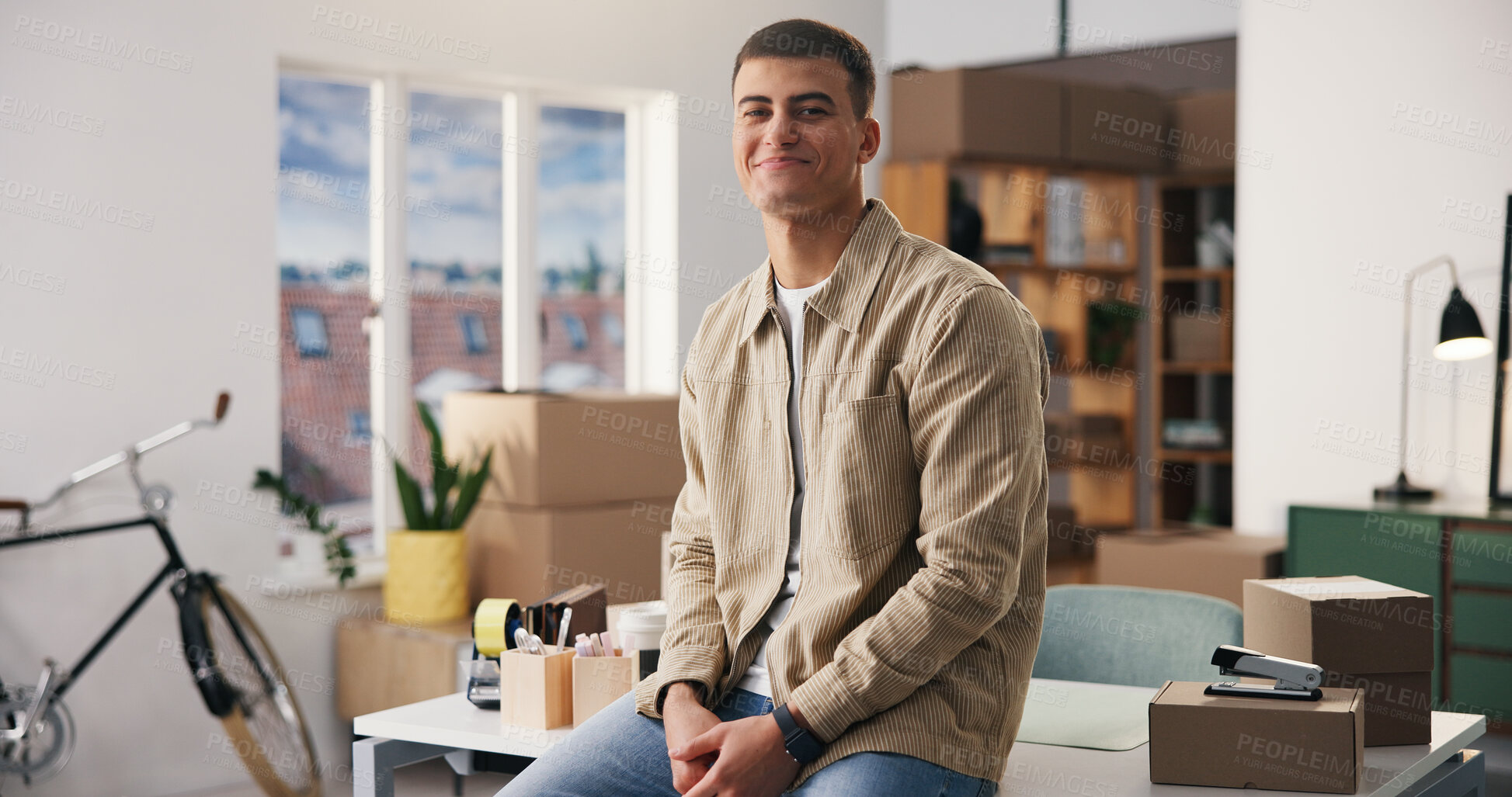 Buy stock photo Portrait, man and smile at small business with logistics, career pride and about us for ecommerce. Happy, male entrepreneur and confident with boxes, supply chain and ambition of package distribution