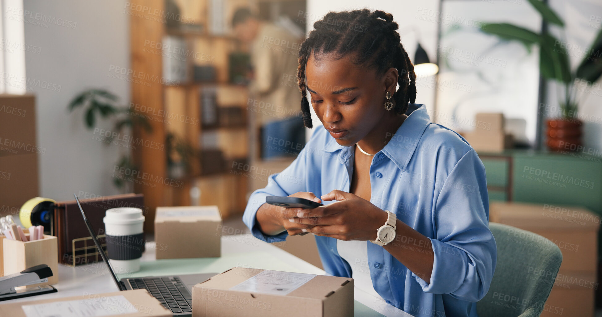Buy stock photo Barcode, box and phone with black woman in logistics office for delivery or distribution tracking. App, photograph and supply chain with African employee at work for management of shipping schedule