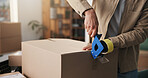 Person, hands and delivery with box for logistics, courier service or tape in small business. Distributor, supplier or cargo with seal for packaging order, safety or security of merchandise in home