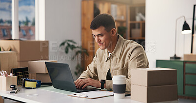 Buy stock photo Laptop, typing and man in office for logistics, inventory review or order update in startup. Computer, smile and shipping entrepreneur in small business to check stock, distribution or ecommerce sale