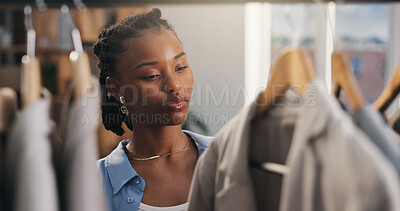 Buy stock photo Decision, fashion and black woman in boutique for shopping, stylish clothes or thinking. African person, consumer or customer in store, luxury retail or options for fabric, promotion or discount deal