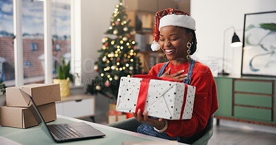 Buy stock photo Christmas, gift and smile with woman in office for holiday celebration, startup and laptop. Festive season, present and dropshipping agency with employee and box for secret Santa and small business