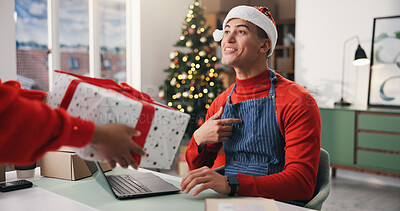 Buy stock photo Christmas, gift and surprise with man in office for holiday celebration, startup and laptop. Festive season, present and dropshipping agency with employee and box for secret Santa and small business